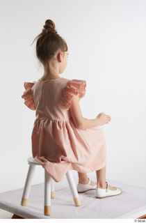 Doroteya  1 casual dressed pink dress sitting white ballerina…